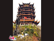 Yellow Crane Tower is located on Sheshan(Snake Hill) in Wuhan, Hubei Province. Enjoying the fame of 'The First Scenery under Heaven', it is one of the most renowned towers south of the Yangtze River. Its cultural significance led to its being made the symbol of Wuhan City.Tourists can obtain a fine view of the Yangtze River from the top of the tower. Yellow Crane Tower is considered one of the Four Great Towers of China. [Photo by Jia Yunlong]