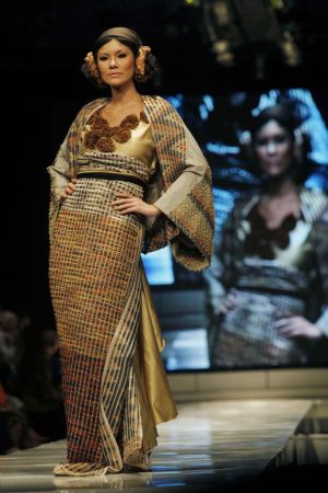 A model presents a creation by Indonesian designer Tuty Cholid during Jakarta Fashion Week November 18, 2009. More than 60 designers from Indonesia took part in the event.