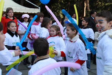 Children play games during a celebration marking the 20th anniversary of the Convention on the Rights of the Child in Tirana, capital of Albania, Nov. 21, 2009.(Xinhua/Yang Ke)