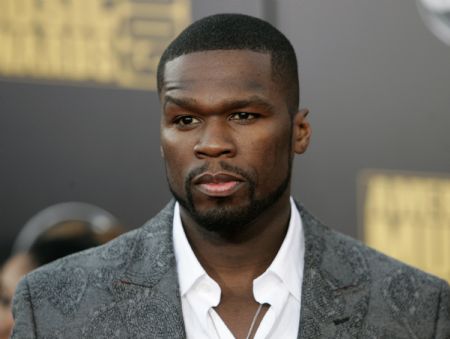 Rap artist Curtis &apos;50 Cent&apos; Jackson arrives at the 2009 American Music Awards in Los Angeles, California November 22, 2009.(Xinhua/Reuters Photo)