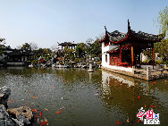 Tongli is an ancient water town in east China's Jiangsu Province. A short drive from Suzhou, Tongli offers a step back in time. Crisscrossed by rivers and canals. Tongli enjoys fame across China for its beautiful rivers, historic bridges and opulent court yard homes. Tongli has 49 stone bridges and many gardens, temples. Because of the landscape, almost all of the buildings are constructed along the waterfront. [Photo by Liu Guoxing]