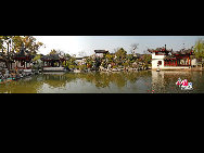 Tongli is an ancient water town in east China's Jiangsu Province. A short drive from Suzhou, Tongli offers a step back in time. Crisscrossed by rivers and canals. Tongli enjoys fame across China for its beautiful rivers, historic bridges and opulent court yard homes. Tongli has 49 stone bridges and many gardens, temples. Because of the landscape, almost all of the buildings are constructed along the waterfront. [Photo by Liu Guoxing]