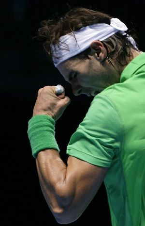 Rafael Nadal of Spain reacts during his ATP World Tour Finals first round tennis match against Robin Soderling of Sweden in London November 23, 2009.