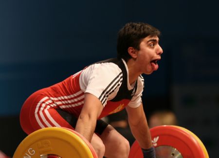 Daluzyan Meline of Armenia competes during the women's 63kg category at the World Weightlifting Championships in Goyang, north of Seoul, South Korea, Nov. 25, 2009. (Xinhua/He Lulu) 
