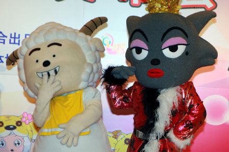 The cast of cartoonish figures for the 2nd edition of serial cartoon feature movie the Sheep Raiders, or Happy Lambs and Ugly Wolf, make their debut at the press conference, in Shanghai, east China, Nov. 25, 2009. The 2nd edition on subtitle of Tiger Majestic-Looking, of the serial cartoon feature movie the Sheep Raiders, is set to be on public show as of the winter vacation in 2010. [Zhu Liangcheng/Xinhua]