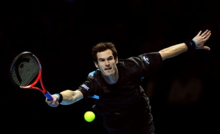 Britain's Andy Murray returns the ball to Spain's Fernando Verdasco during their ATP World Tour Finals tennis match at the 02 Arena in London November 26, 2009