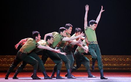 Dancers perform at the Great Hall of the People to celebrate the 60th anniversary of the founding of the People&apos;s Republic of China and the founding of Chinese Dancers Association in Beijing, Nov. 28, 2009. (Xinhua/Zhang Lei)