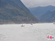 The Three Gorges Dam is a hydroelectric river dam that spans the Yangtze River in Sandouping, Yiling District,Yichang, Hubei, China. It is the world's largest electricity-generating plant of any kind. The dam site is 27 miles upstream from Yichang City proper, at Sandouping Town, 38km upstream from the Gezhouba Dam Lock, inside the third of the Three Gorges.  It has been a dream for generations.Now it has become a popular tourist site in China. [Photo by Jia Yunlong] 