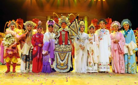 Ten "Meihua Award" winners pose for pictures after the performance of an art show at Hangzhou Theater in Hangzhou, capital of east China