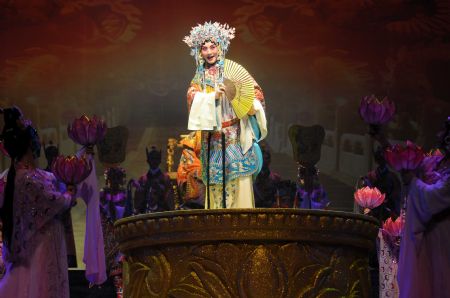 "Meihua Award" winner Wang Runjing (C) performs Beijing Opera "Drunken Beauty" during an art show at Hangzhou Theater in Hangzhou, capital of east China