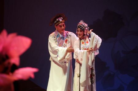 Photo taken on Nov. 29, 2009 shows a scene of "Peony Pavilion", a well-known Chinese traditional Kunqu Opera, at Hangzhou Theater in Hangzhou, capital of east China