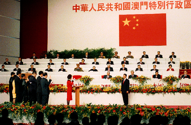 Principal officials of the Macao SAR are sworn in during the transfer of sovereignty of Macao from the Portuguese Republic to the People's Republic of China. The transfer occurred on Dec. 20, 1999.  