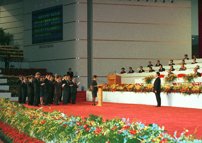 Principal officials of the Macao SAR are sworn in during the transfer of sovereignty of Macao from the Portuguese Republic to the People's Republic of China. The transfer occurred on Dec. 20, 1999.  