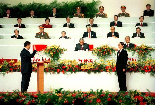 Chief Executive Edmund Ho Hao Wa takes oath during the transfer of sovereignty of Macao from the Portuguese Republic to the People's Republic of China.  