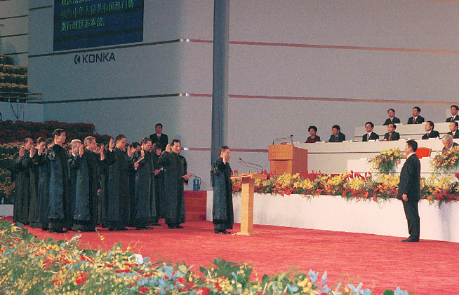 Principal officials of the Macao SAR are sworn in during the transfer of sovereignty of Macao from the Portuguese Republic to the People's Republic of China. The transfer occurred on Dec. 20, 1999.