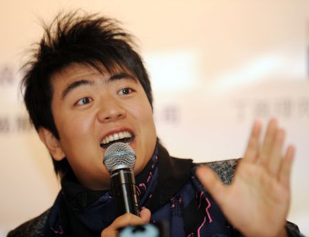 Lang Lang answers questions at the press conference in Taipei, southeast China's Taiwan Province, Nov. 30, 2009. Lang Lang Charity Concert will be held at Taipei Arena on Dec. 2, and all the tickets sales will be donated for the rebuilding construction damaged by Typhoon Morakot in August.