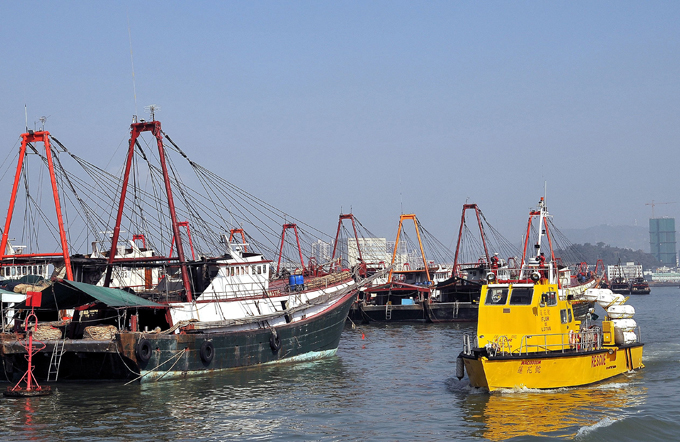 Many fishing boats berth at Macao Interior Port during Chinese New Year. Fishermen are used to going home for Chinese New Year.
