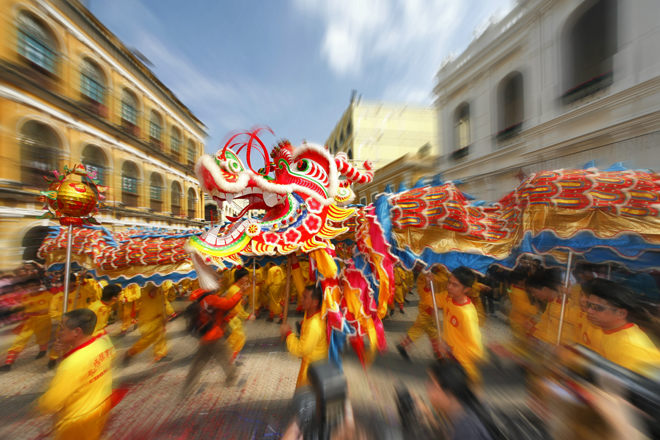 People perform dragon dances to celebrate Chinese New Year.