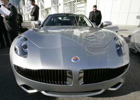 A Fisker Automotive Karma electric luxury car is seen on display during a preview at the 2009 L.A. Auto Show in Los Angeles, California December 1, 2009.