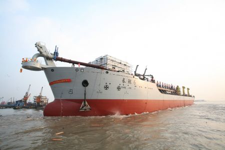 Chang Jing 6, one of the country's largest Trailing Suction Hopper Dredger, is launched in Nantong, east China's Jiangsu Province, Dec. 3, 2009.(Xinhua/Wang Junrong)
