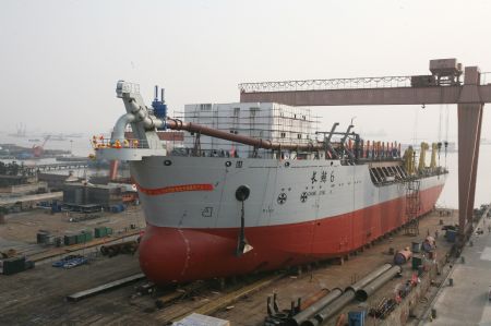 Chang Jing 6, one of the country's largest Trailing Suction Hopper Dredger, is to be launched in Nantong, east China's Jiangsu Province, Dec. 3, 2009. With a cabin space of 13,280 cubic meters, the dredger of Changjing 6, with China's proprietary intellectual property rights, will be earmarked for dredging and hydraulic filling on the coastal ports and Yangtze River's navigational routes, in addition to coastal maintenance projects.(Xinhua/Wang Junrong)