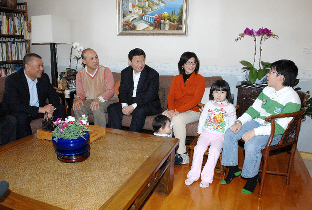 Chinese Vice President Xi Jinping visits a family living in Macao. Vice President Xi met with the Macao residents on Jan. 10, 2009.