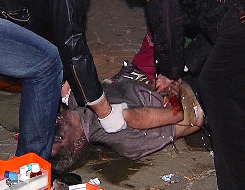 Paramedics carrying a stretcher with an injured person towards an ambulance in Perm Dec. 5, 2009. At least 111 people were killed and 139 injured on Friday when a blast caused by fireworks ripped through a packed nightclub in Perm, causing a stampede, the Emergencies Ministry said.