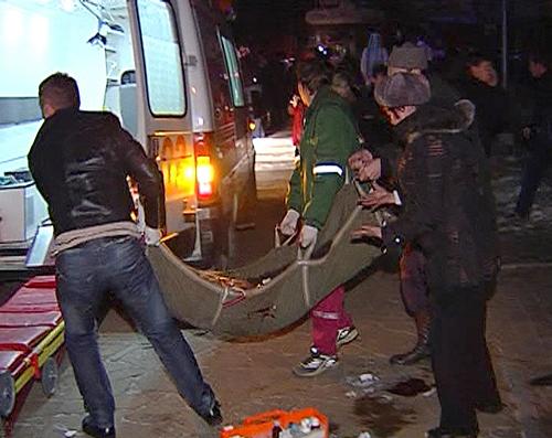 Image from a video grab shows paramedics carrying a stretcher with an injured person towards an ambulance in Perm Dec. 5, 2009. At least 111 people were killed and 139 injured on Friday when a blast caused by fireworks ripped through a packed nightclub in Perm, causing a stampede, the Emergencies Ministry said. 