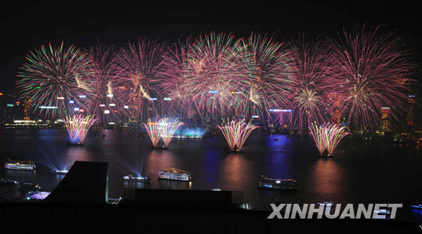 Fireworks explode over the Victoria Harbour during the opening ceremony of the 2009 East Asian Games in Hong Kong, south China, Dec. 5, 2009. [Xinhua]