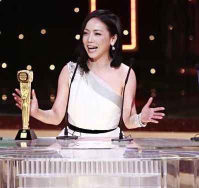 Sheren Tang receives the best actress award at the TVB Anniversary Awards 2009 in Hong Kong, Dec. 4. 
