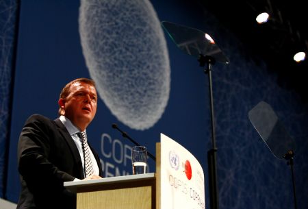 Danish Prime Minister Lars Rasmussen addresses the opening of the 15th United Nations Climate Change Conference (COP15) at Bella Center in Copenhagen, capital of Demark, Dec. 7, 2009. The conference will be held from Dec. 7 to 18 in Copenhagen. [Zhang Yuwei/Xinhua]