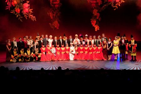 China&apos;s Xinjiang troupe performers pose during a singing and dancing performance in Brisbane, Australia, on Dec. 7, 2009. Brisbane serves as the second stop of China&apos;s Xinjiang foreign cultural exchange delegation during its visit in Australia. [Chen Mingwei/Xinhua]