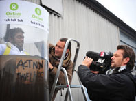 Oxfam activist stages underwater protest at climate talks