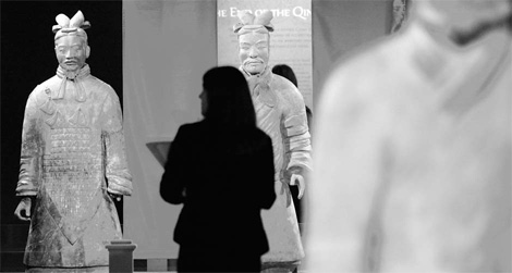 A woman looks at Terracotta Warriors on display at the National Geographic Museum in Washington. 