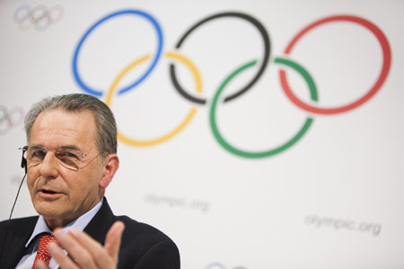 Jacques Rogge, President of the International Olympic Committee (IOC) addresses a news conference following the executive board meeting at the IOC headquarters in Lausanne December 10, 2009. [Xinhua/Reuters]