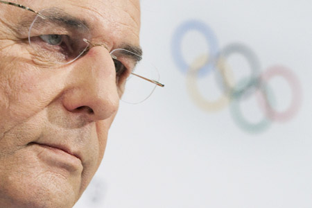 Jacques Rogge, President of the International Olympic Committee (IOC) addresses a news conference following the executive board meeting at the IOC headquarters in Lausanne December 10, 2009. [Xinhua/Reuters]