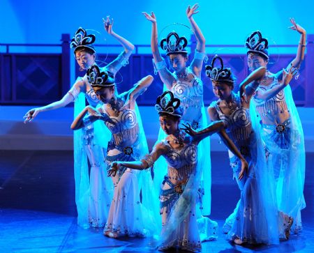 Dancers perform during a dress rehearsal for the Dunhuang dance show "Flying Apsars" in Taipei of southeast China