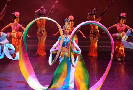 Dancers perform during a dress rehearsal for the Dunhuang dance show "Flying Apsars" in Taipei of southeast China