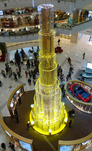 A decorative tree built for Christmas and New Year celebration is seen in Shanghai municipality in east China, Dec. 13, 2009. [Pei Xin/Xinhua]