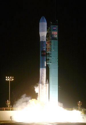 This NASA handout photo shows the United Launch Alliance Delta II rocket with NASA&apos;s Wide-field Infrared Survey Explorer, or WISE, satellite as it launches. NASA launched Monday a new breed of satellite called WISE on a mission to orbit Earth and map the skies to find elusive cosmic objects, including potentially dangerous asteroids.[Xinhua/AFP]