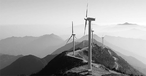 A wind power installation in Jiugongshan, Hubei province. China has become the third largest wind power generator in the world with an installed capacity exceeding 16 million kW by June this year. [China Daily]