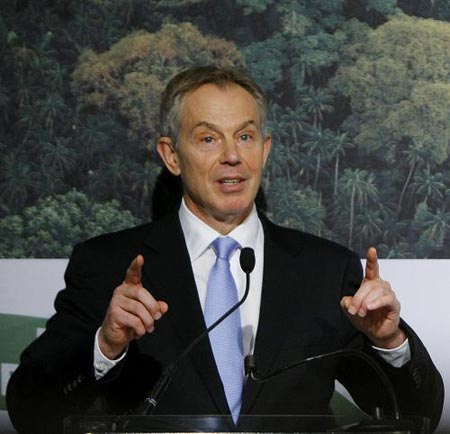 Photo taken on Dec.13 shows Former British Prime Minister Tony Blair gives a speech in Copenhagen, Denmark's capital. Tony Blair called for the ongoing Copenhagen climate change talks to translate the emission cut commitments into practical measures on Sunday.