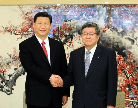 Chinese Vice President Xi Jinping (L) meets with Takahiro Yokomichi, speaker of Japan&apos;s House of Representatives, in Tokyo, Japan, Dec. 15, 2009. [Xinhua]