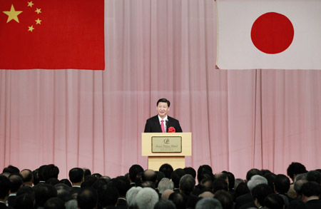  Chinese Vice President Xi Jinping addresses a welcoming reception jointly held by seven Japanese organizations for Japan-China friendship and four organizations of local overseas Chinese in Tokyo, Japan, Dec. 15, 2009. [Xinhua]