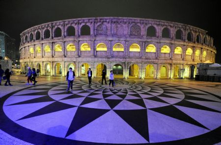 This photo taken on Dec. 14, 2009 shows the night scene of Macao Special Administrative Region in south China. Macao, an enclave of Portugal for about 400 years, is to mark the 10th anniversary of its return to China on Dec. 20. (Xinhua/Song Zhenping) 