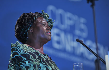 Nobel Peace Prize laureate Wangari Maathai of Kenya addresses the opening ceremony of the high-level segment of UN Climate Change Conference in Copenhagen, capital of Denmark,Dec. 15, 2009.(Xinhua/Wu Wei)