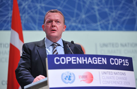 Danish Prime Minister Lars Lokke Rasmussen addresses the opening ceremony of the high-level segment of UN Climate Change Conference in Copenhagen, capital of Denmark, Dec.15, 2009. (Xinhua/Wu Wei)