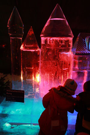 Children look at the ice sculptures on display during the China Ice Sculpture Art Festival in Berlin, capital of Germany, Dec. 15, 2009. The China Ice Sculpture Art Festival runs from Nov. 27, 2009 to Feb. 19, 2010. (Xinhua/Luo Huanhuan)