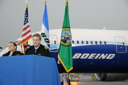 Boeing test pilot Mike Carriker (R) and first officer Randy Neville speak to the media after landing the 787 Dreamliner at Boeing Field in Seattle, Washington after its maiden flight, December 15, 2009. Boeing Co completed the first test flight of its new lightweight carbon and titanium Dreamliner, but the flight was cut short because of bad weather. The flight was more than two years behind schedule because of manufacturing and design problems.