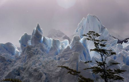 A general view of Argentina's Perito Moreno glacier during sunset near the city of El Calafate, in the Patagonian province of Santa Cruz, December 14, 2009. Scientists warn that glaciers in the Andes are melting because of the effects of climate change. According to studies, these accumulations of ice are thawing at a pace so fast that they could disappear in 25 years. (